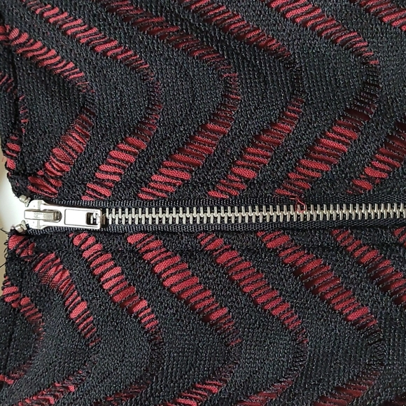 Burgundy dress with black design on the top art of the dress. Size Small - Picture 8 of 9